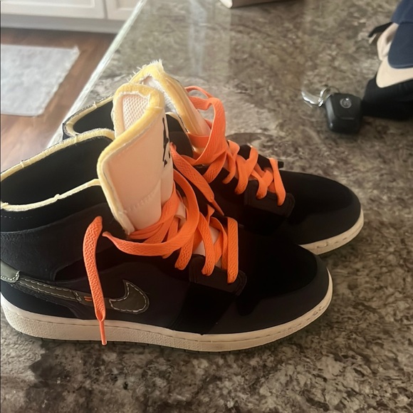 Nike Black Sneakers with Orange Accents